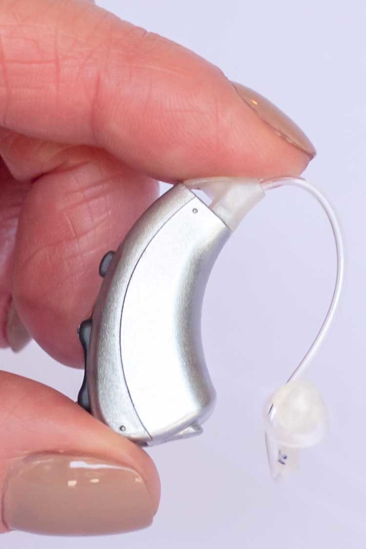 Evok 800 behind the ear hearing aid in hand