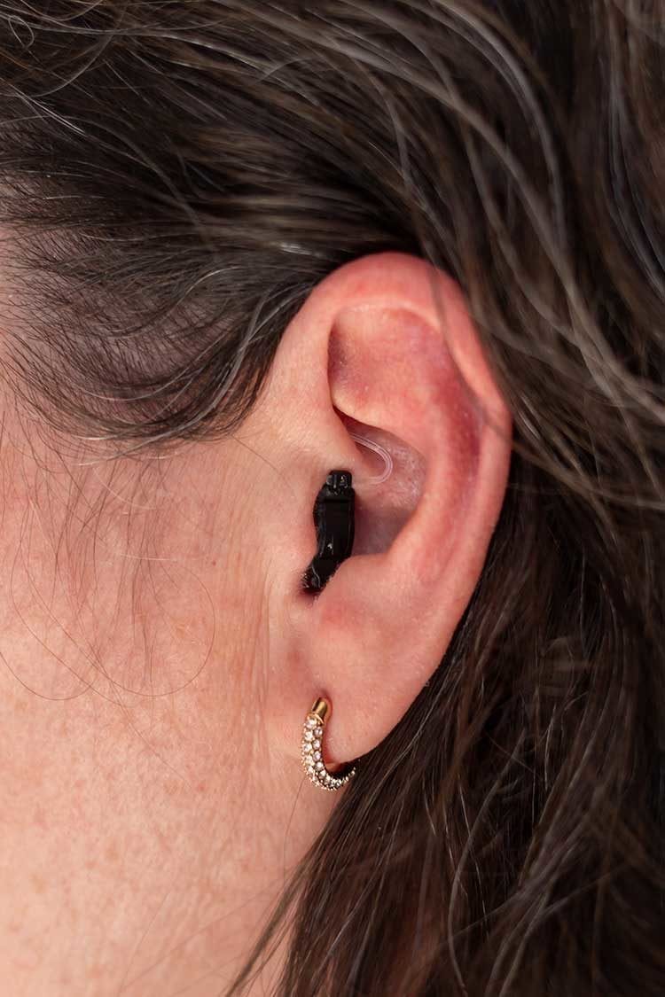 Almost invisible Ole 2 hearing aid in ear